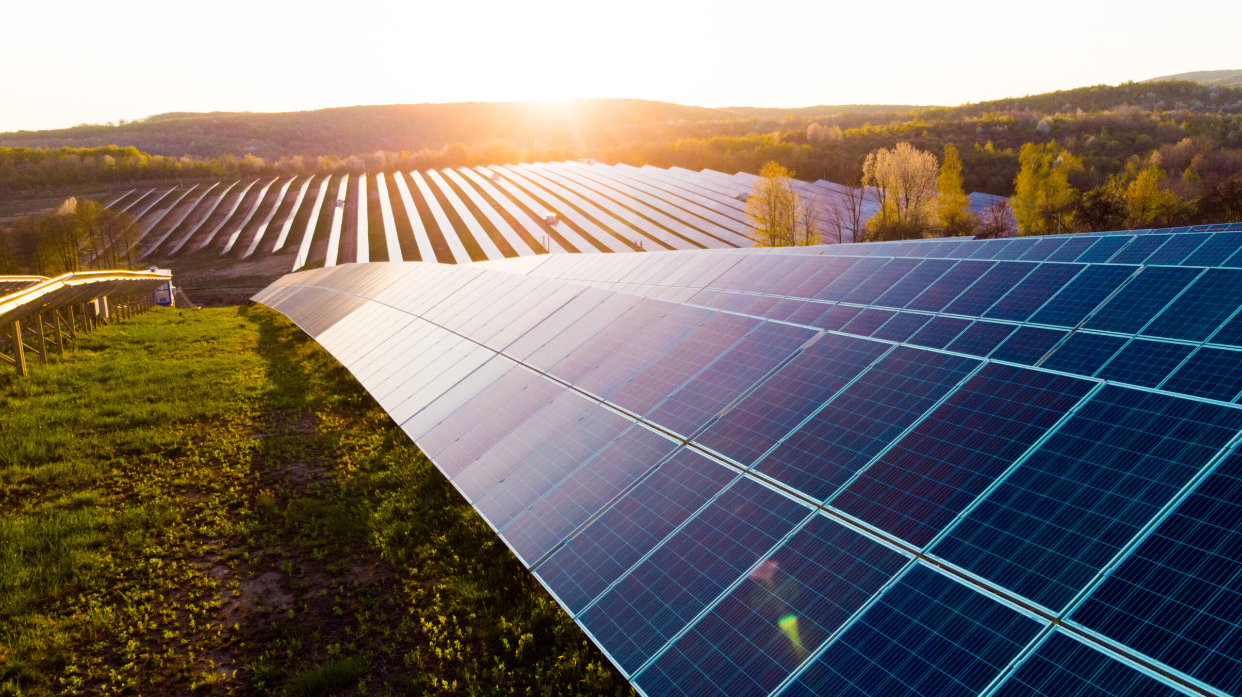 Solar panels (solar cell) in solar farm with sun lighting to cre